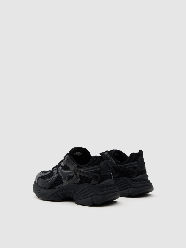 Deportiva casual running nylon negro vista trasera 45º