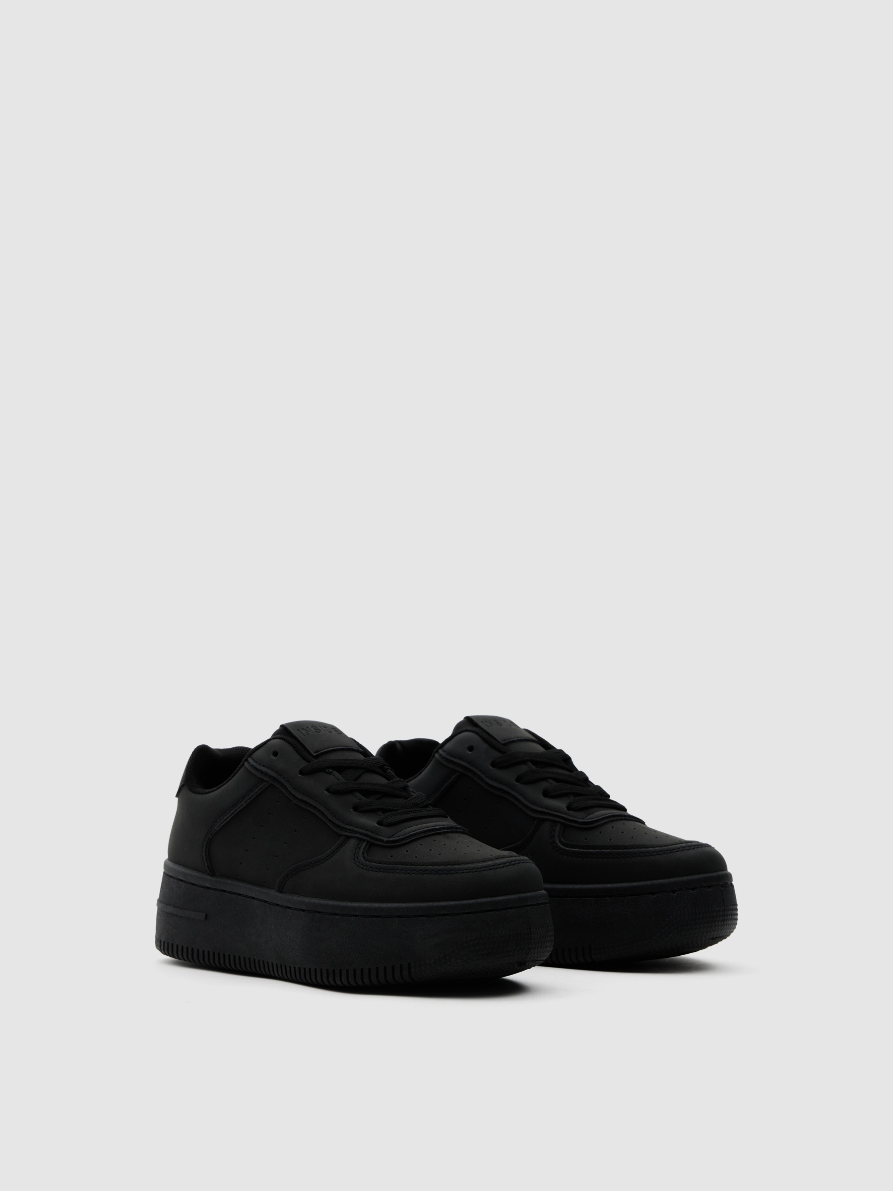 Deportiva baja cremallera plataforma negro