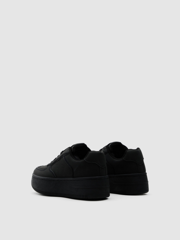 Deportiva baja cremallera plataforma negro vista trasera 45º