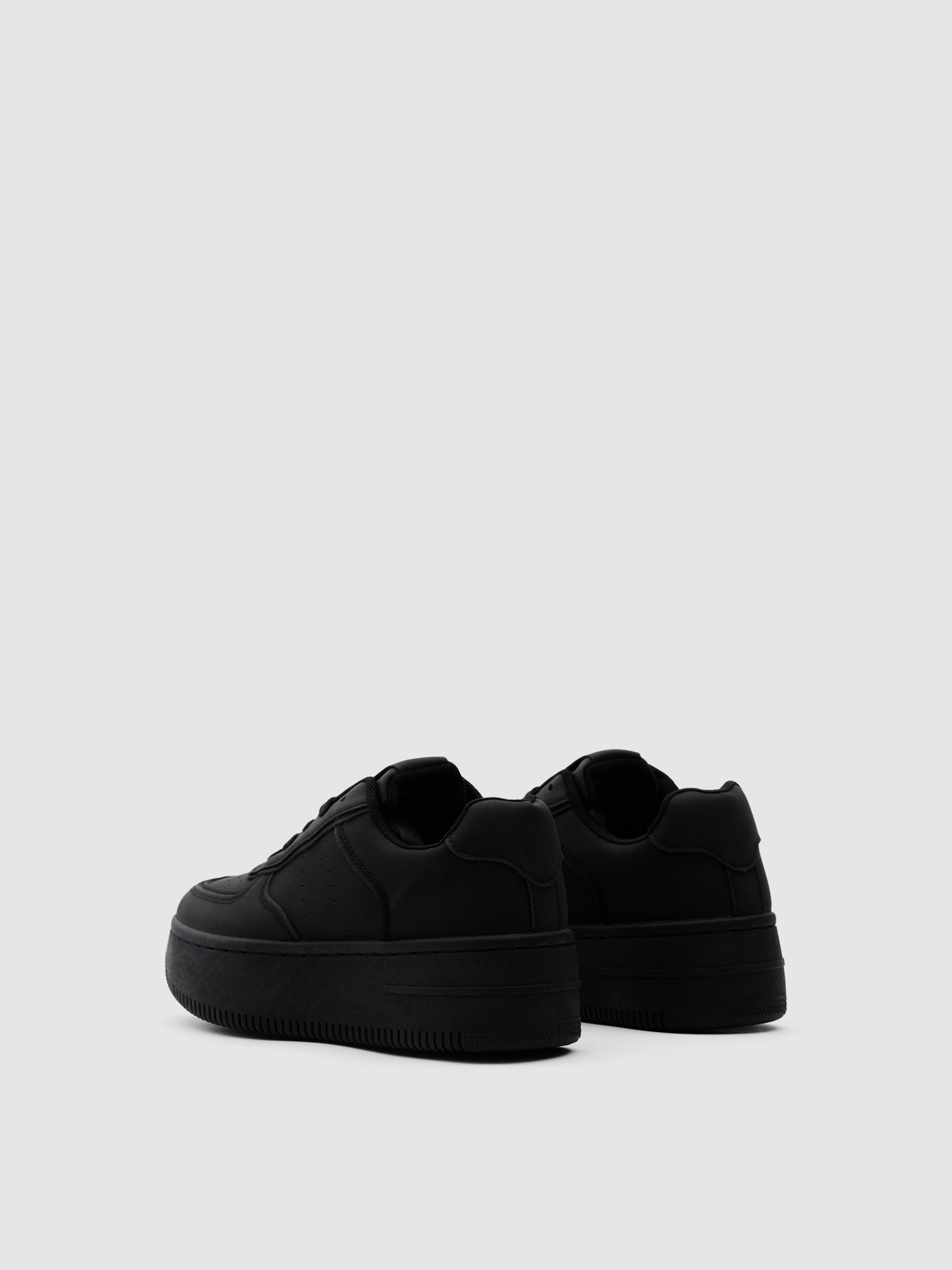 Deportiva baja cremallera plataforma negro