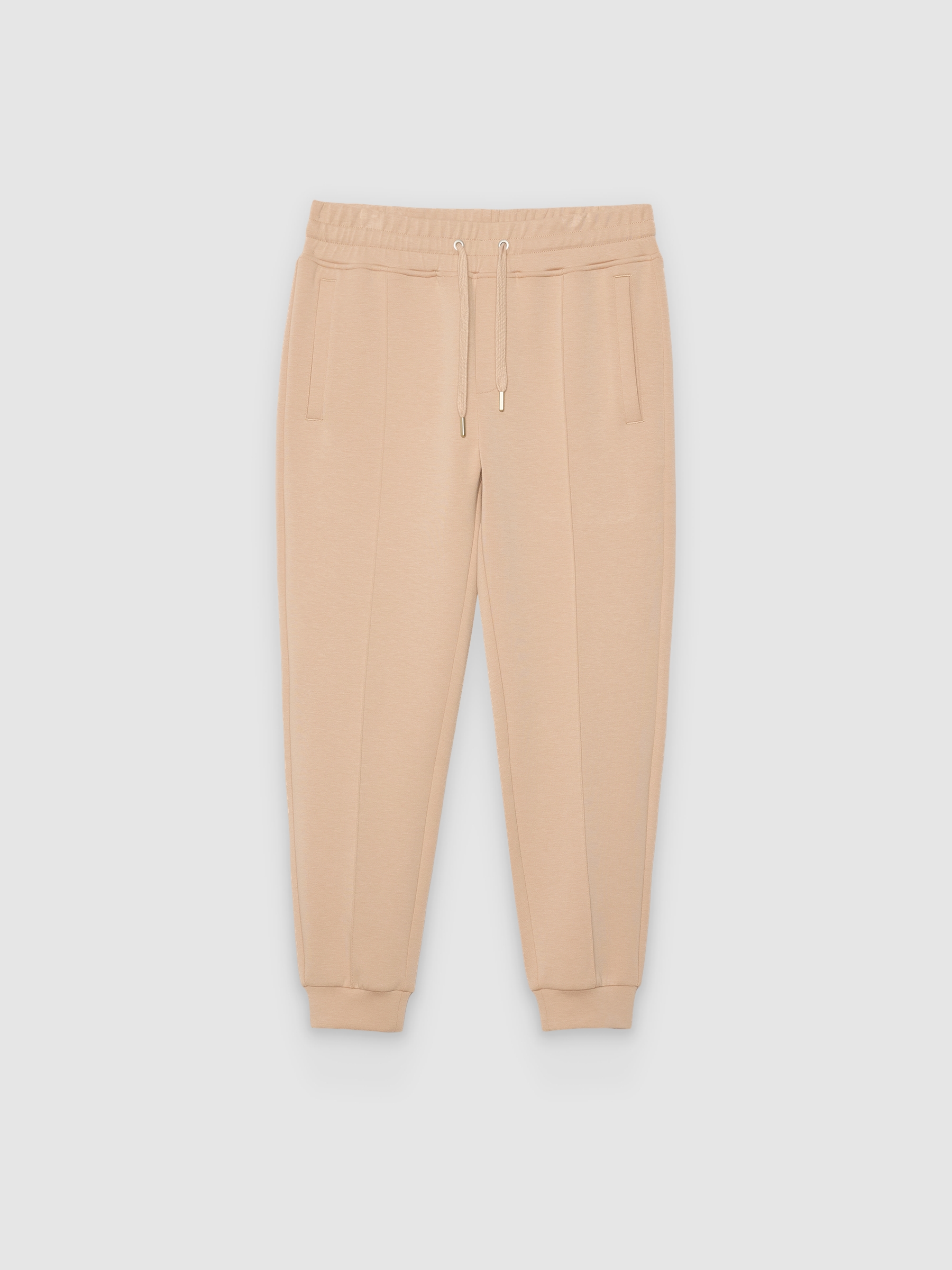 Pantalón jogger slim fit de felpa beige vista general frontal
