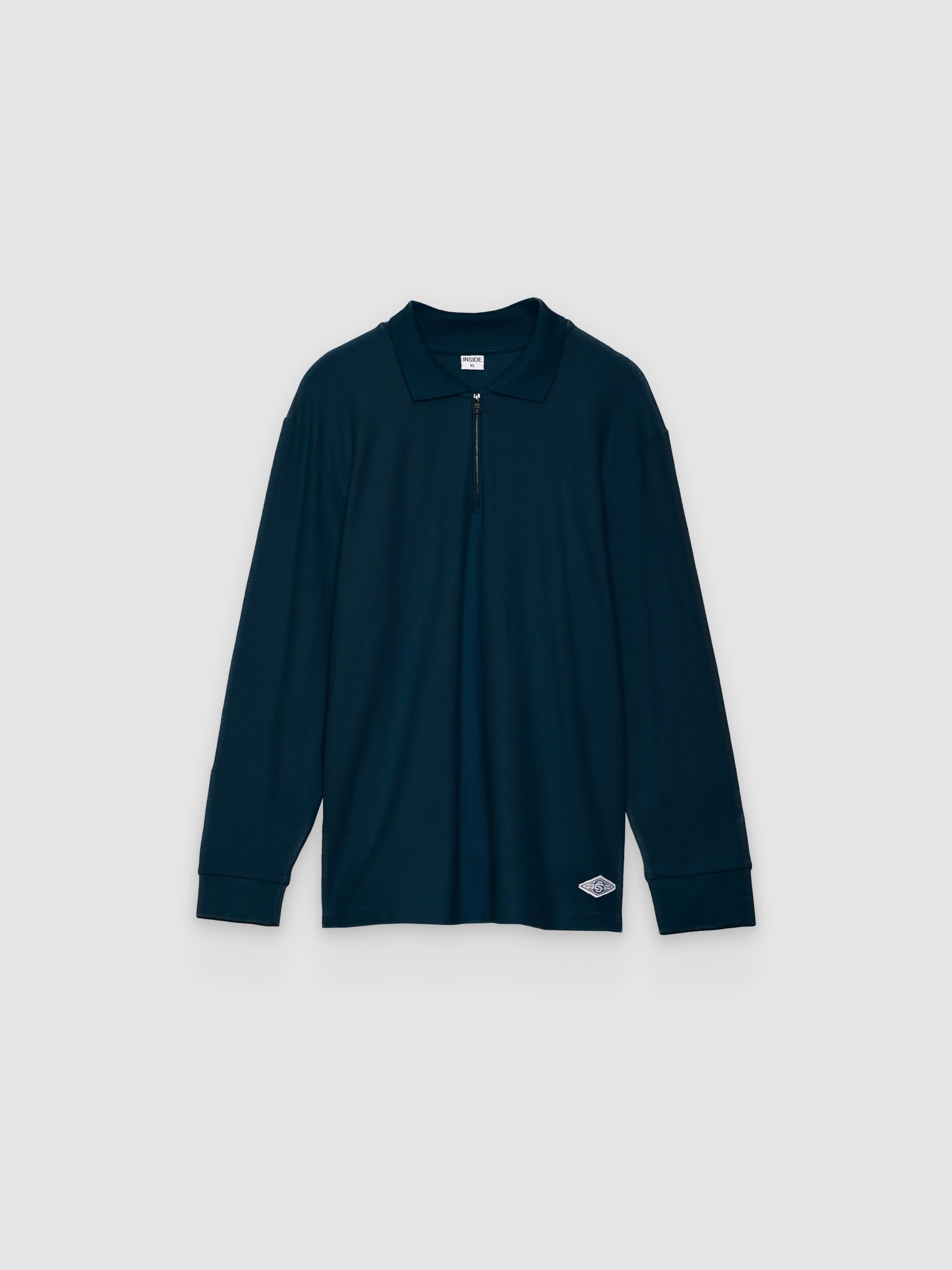 Polo oversized de manga longa liso azul marinho vista meia frontal