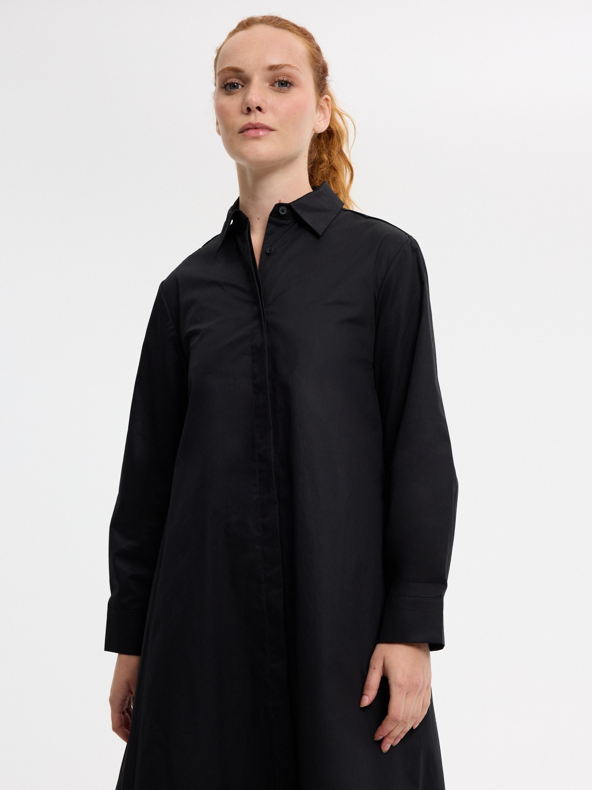 Plain fluid midi shirt dress black front view
