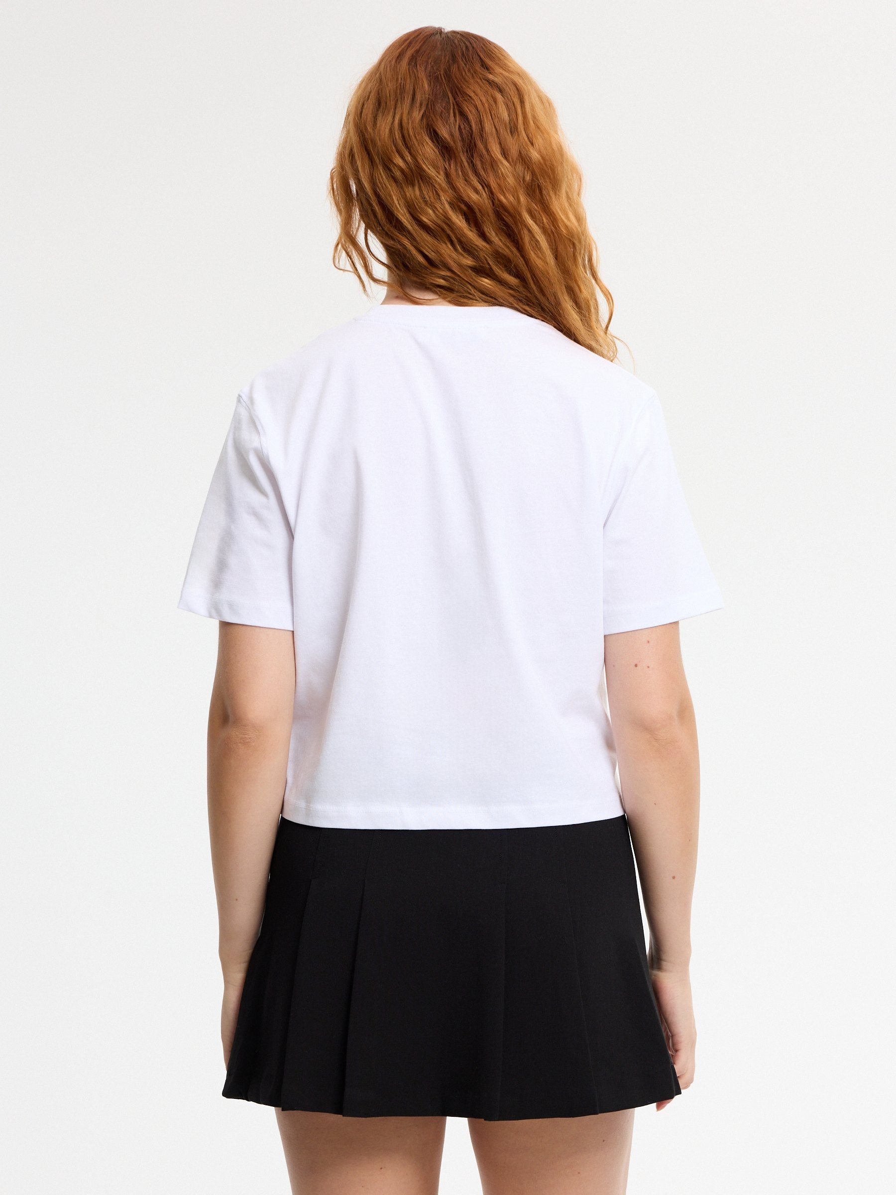 Camiseta crop flores algodón blanco vista media frontal