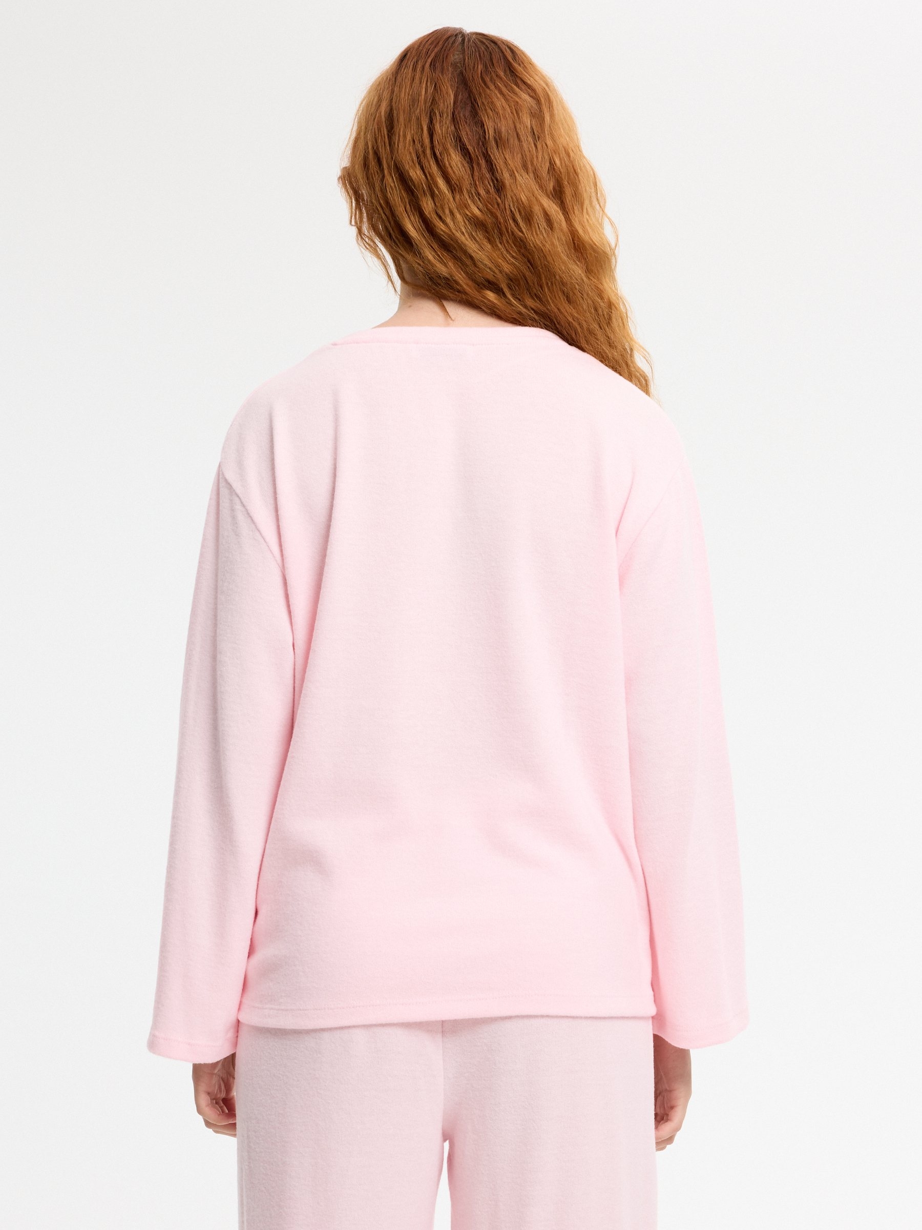 Oversized knit T-shirt light pink middle front view