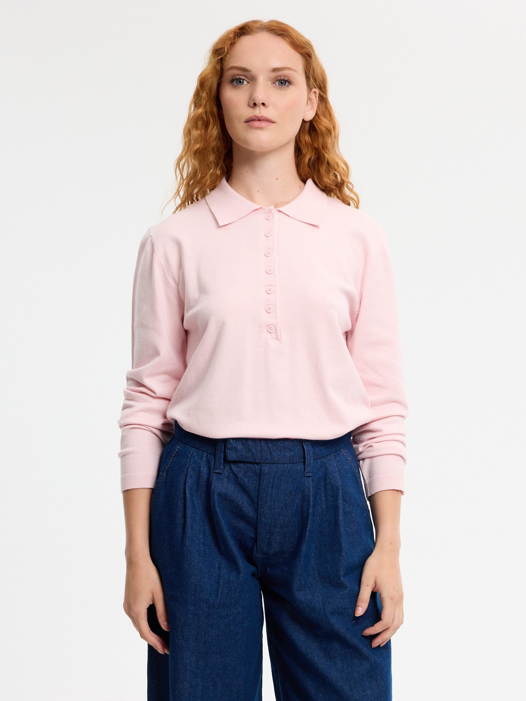 Knitted polo sweater with buttons light pink middle front view