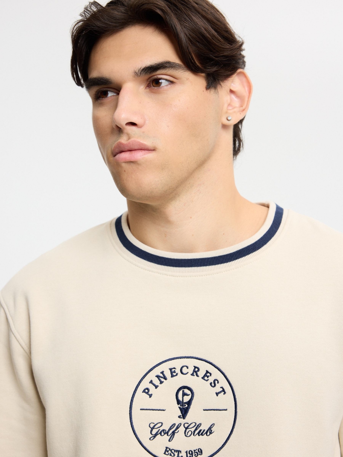 Embroidered oversized golf club sweatshirt raw detail view