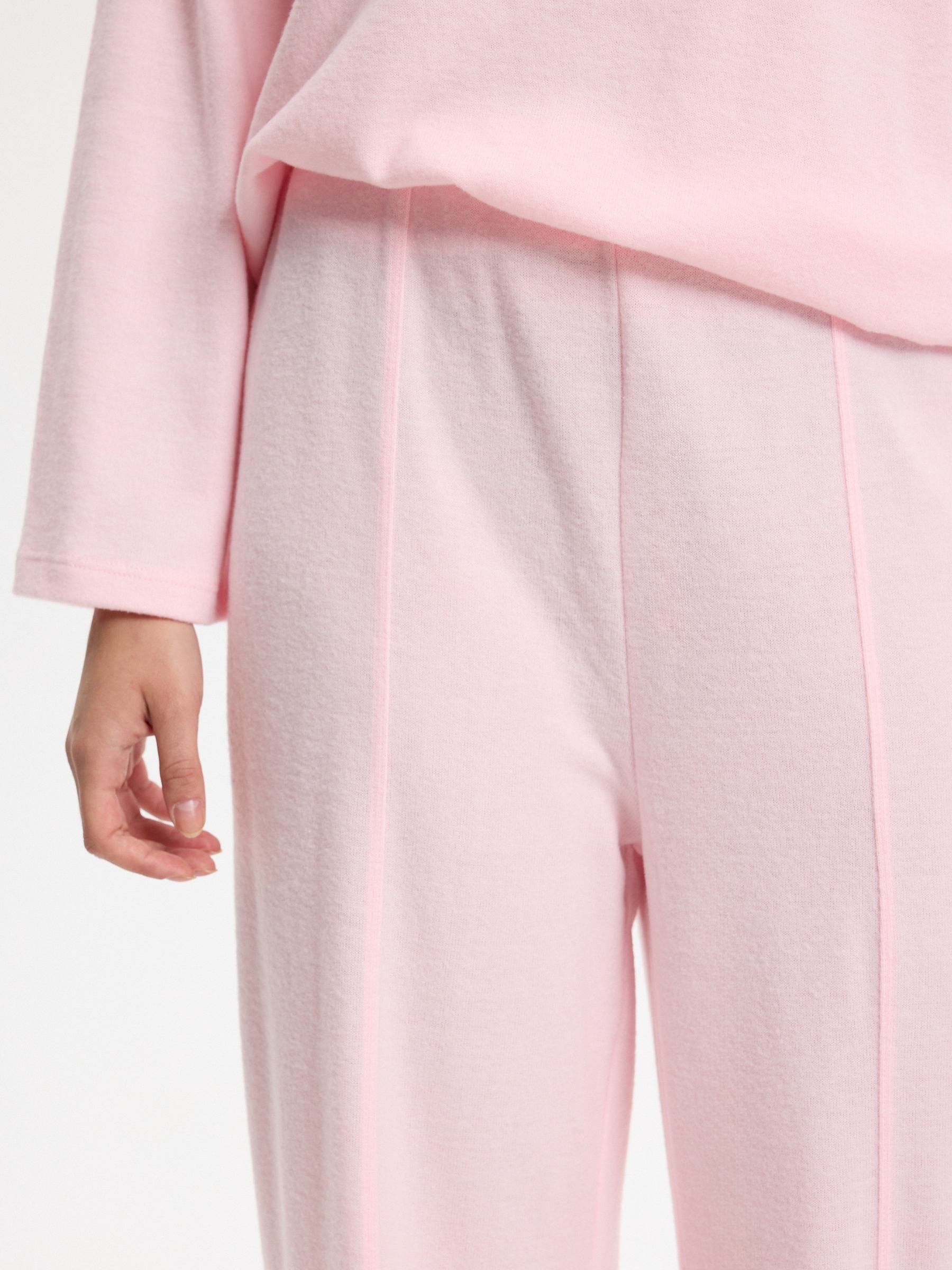 High-waisted soft wide-leg pants light pink front view