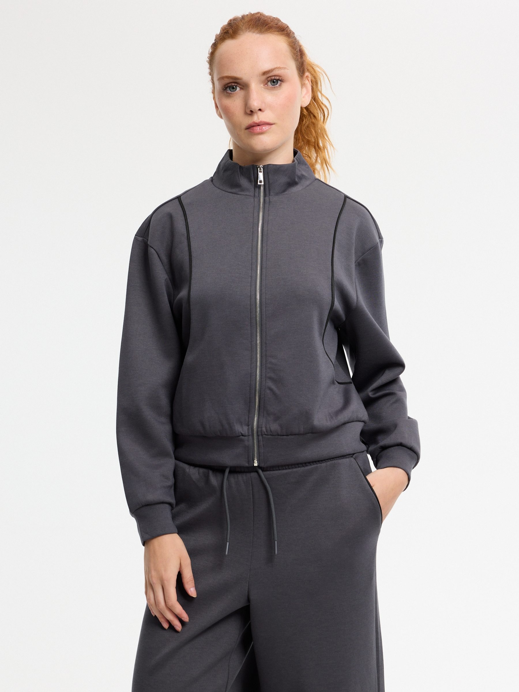 Soft zip-up jacket with high collar dark grey middle front view