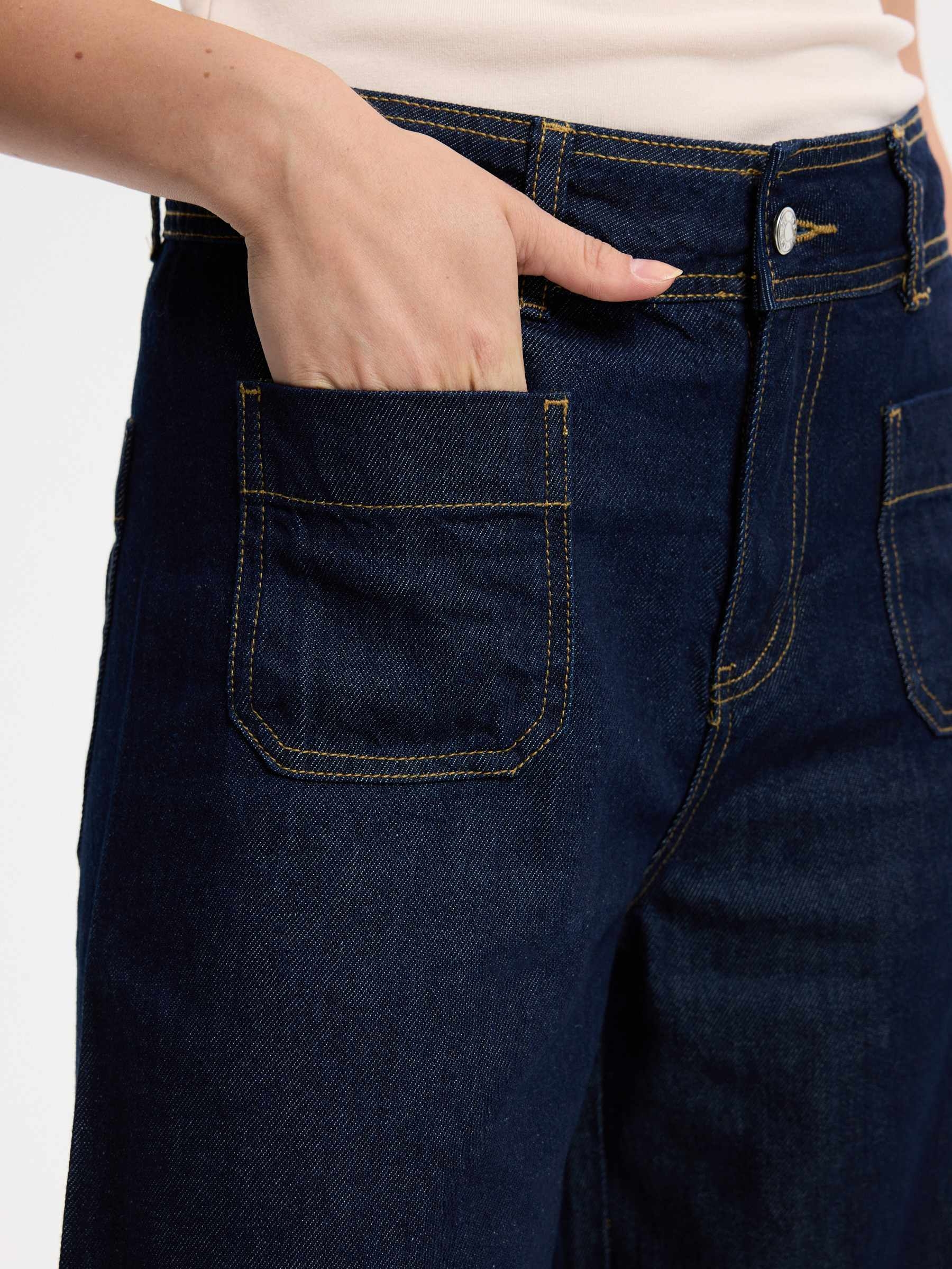 Dark wide-leg multi-pocket jeans dark blue front view