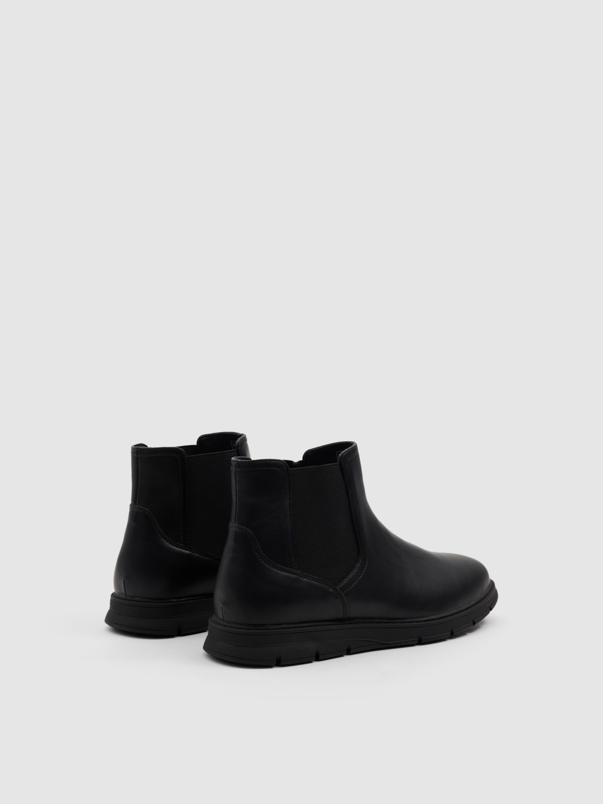 Chelsea ankle boot faux leather rubber black 45º back view