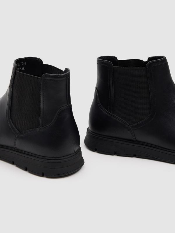 Chelsea ankle boot faux leather rubber black detail view