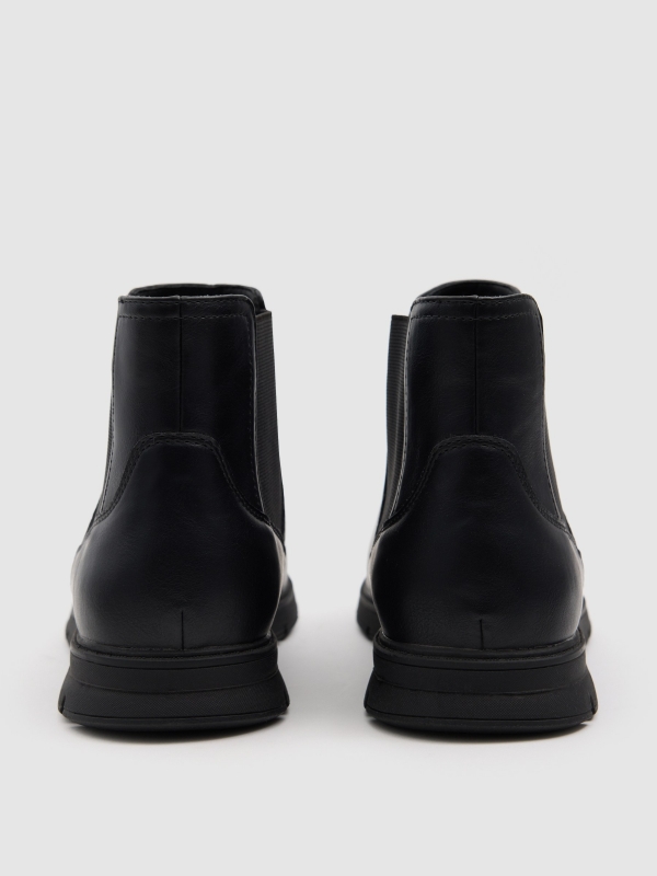 Chelsea ankle boot faux leather rubber black detail view