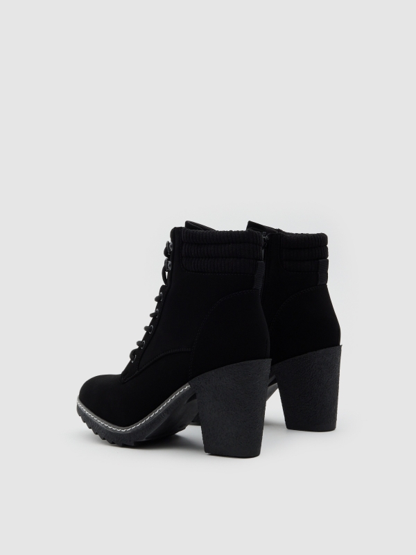 Botines con cuello combinado negro vista trasera 45º