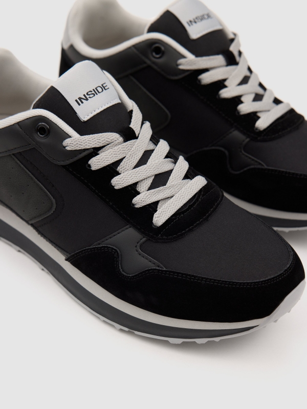Tênis esportivo para corrida nylon borracha preto vista detalhe