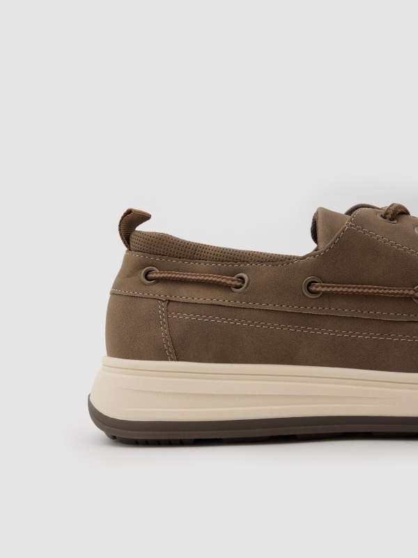 Boat shoe synthetic leather rubber sole dark brown detail view