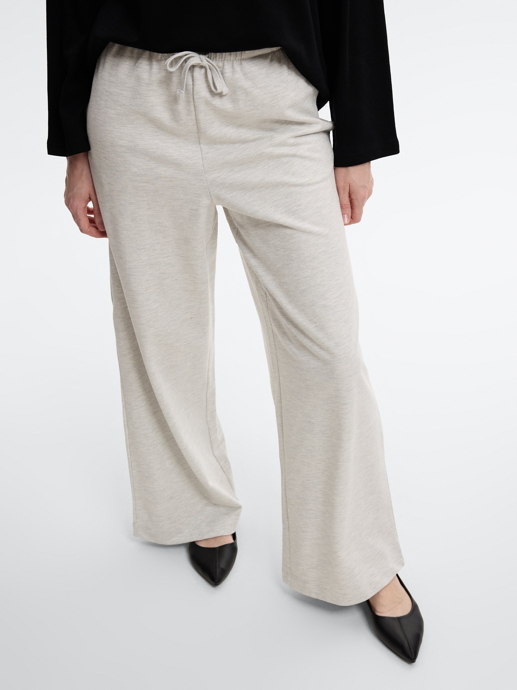 Plain high-waisted fleece sweatpants light melange front view
