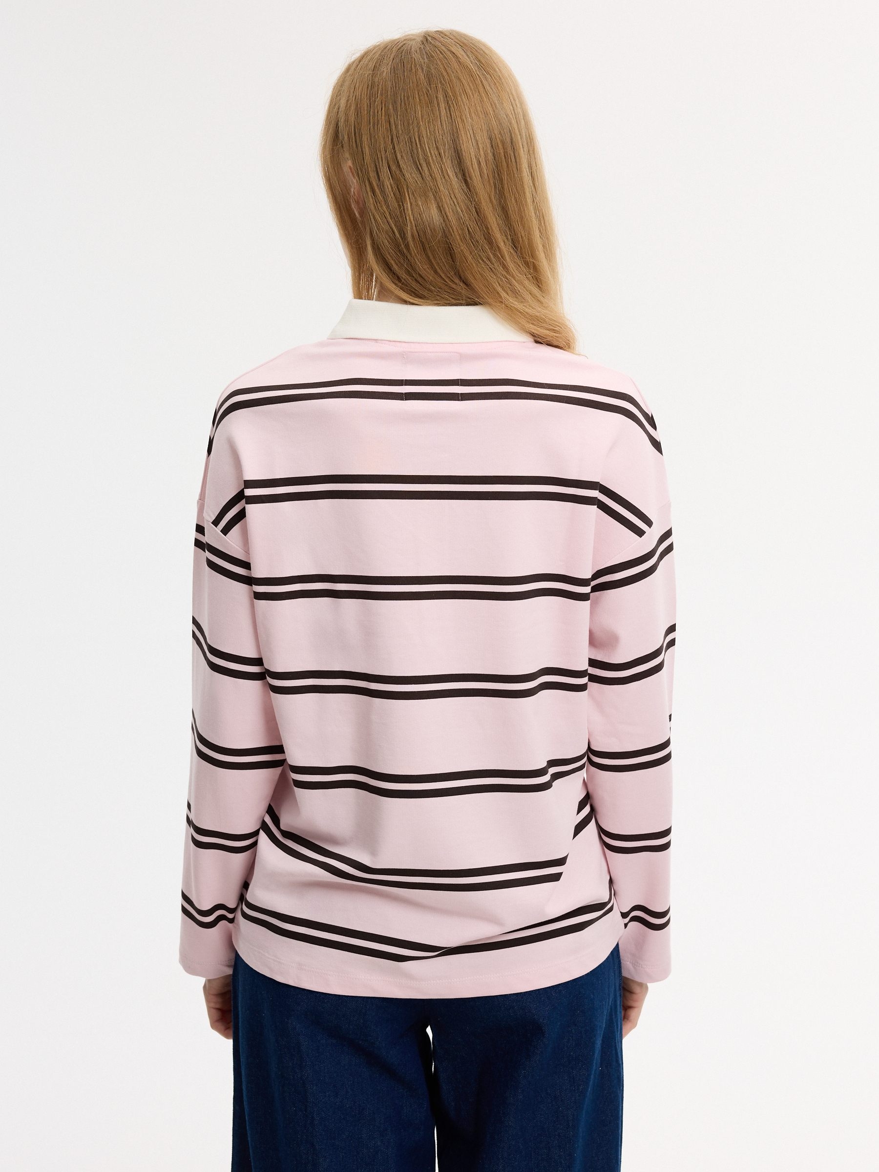 Striped fleece polo sweatshirt light pink middle front view