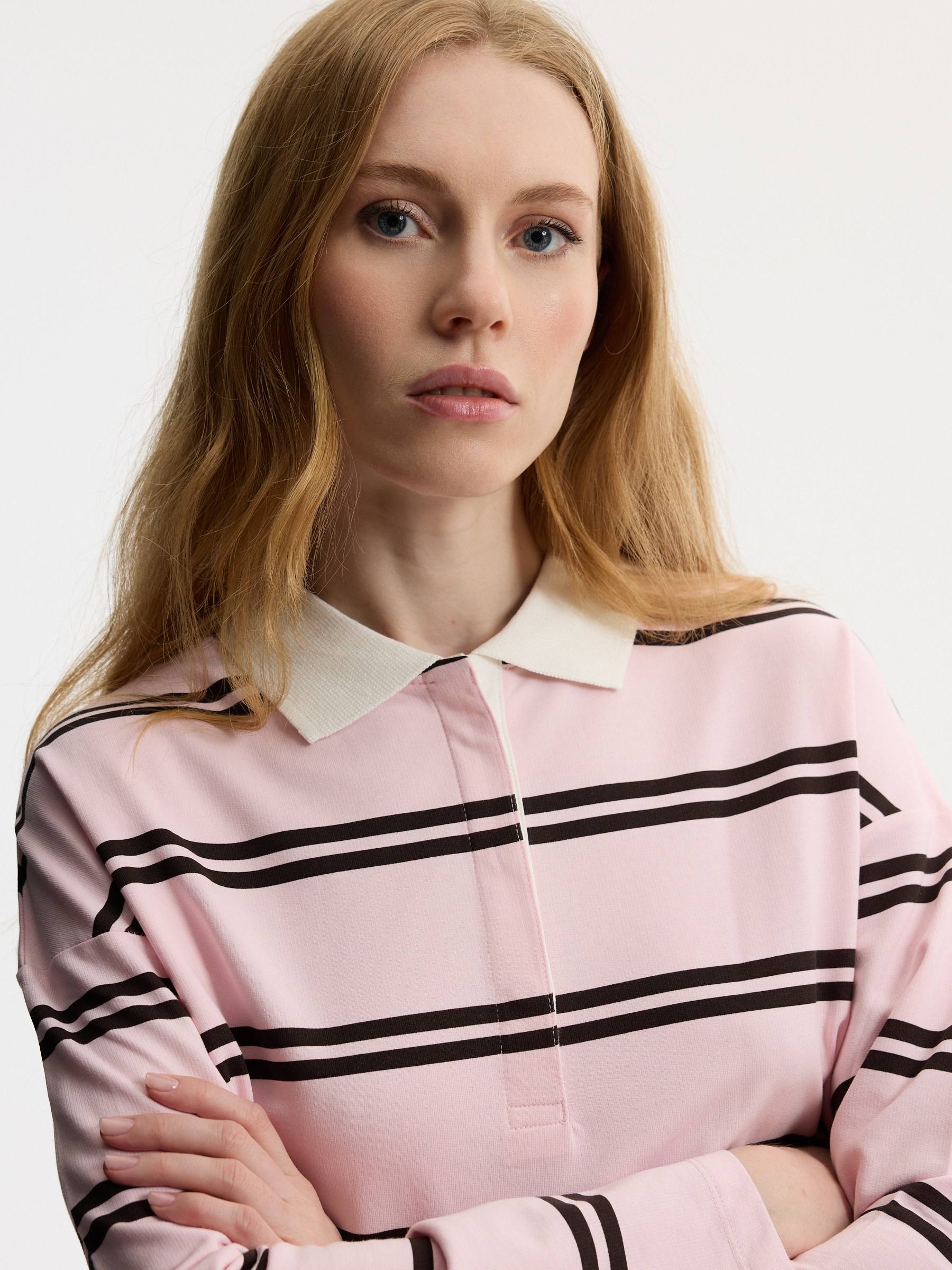 Striped fleece polo sweatshirt light pink middle front view