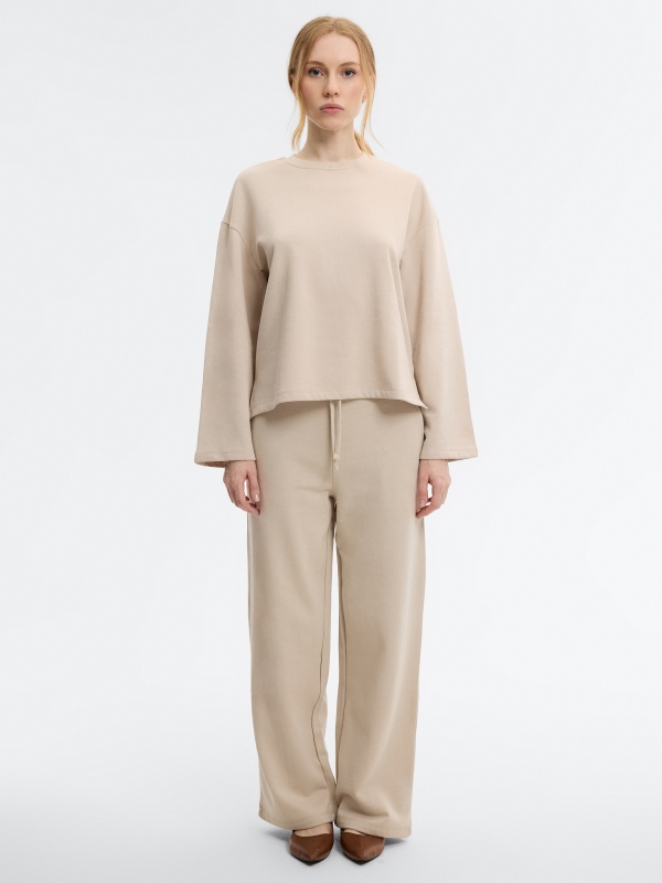 Pantalón chándal wide leg crudo vista general frontal