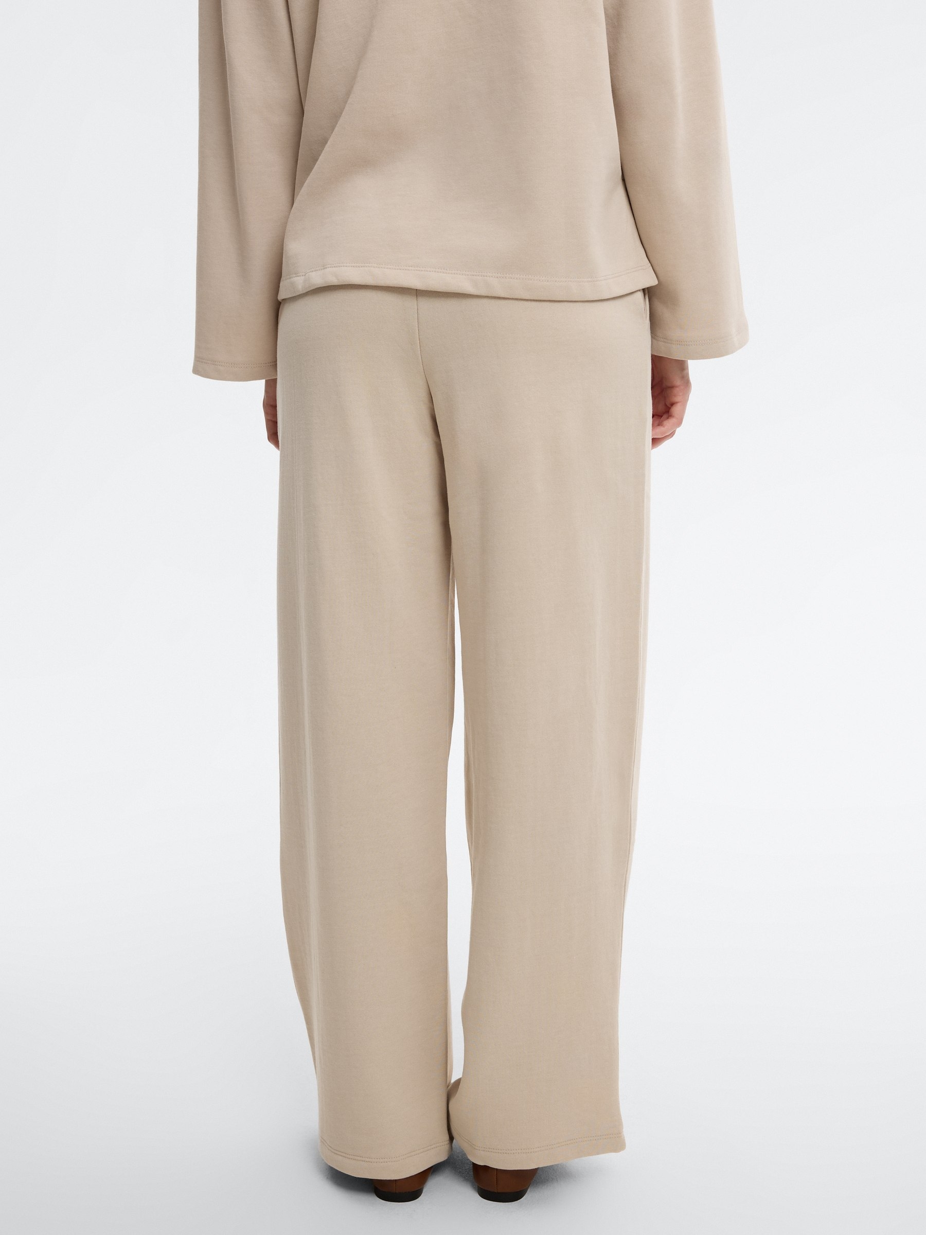 Pantalón chándal wide leg crudo vista general frontal