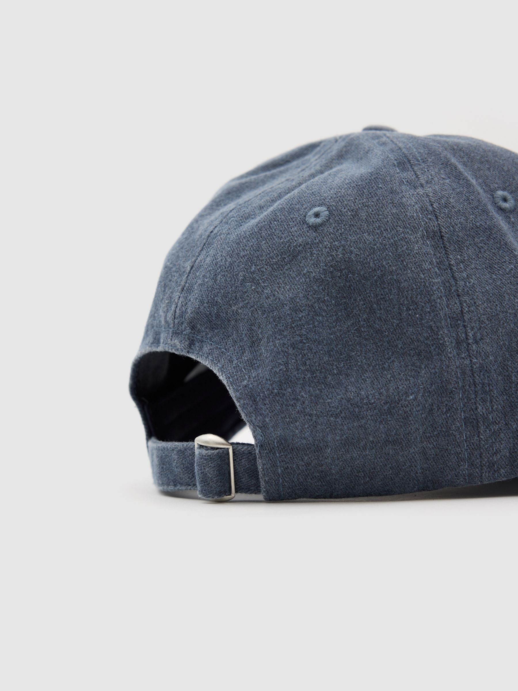 Gorra baseball lavada azul vista lateral frontal 45º