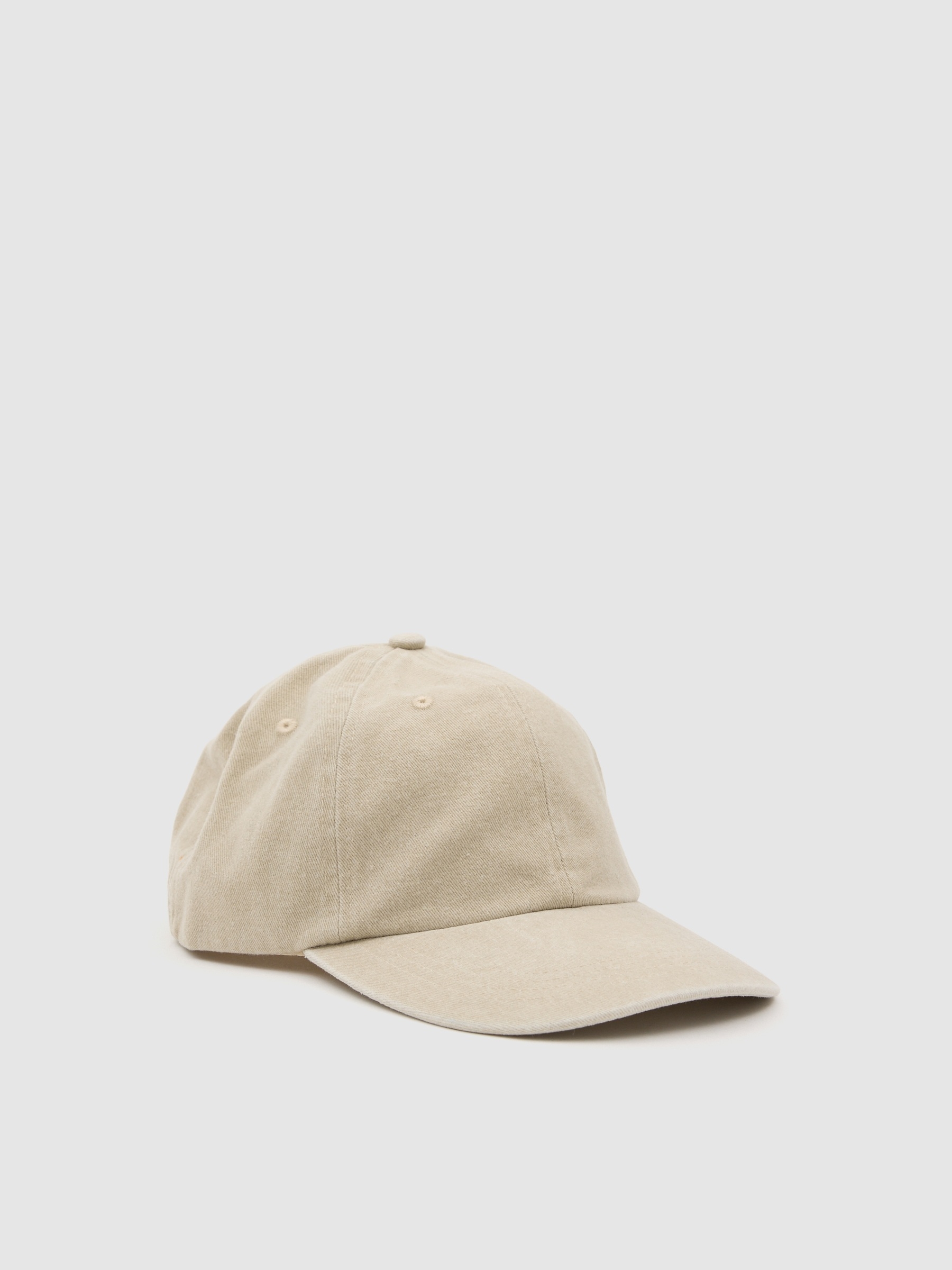 Gorra baseball lavada beige vista lateral frontal 45º
