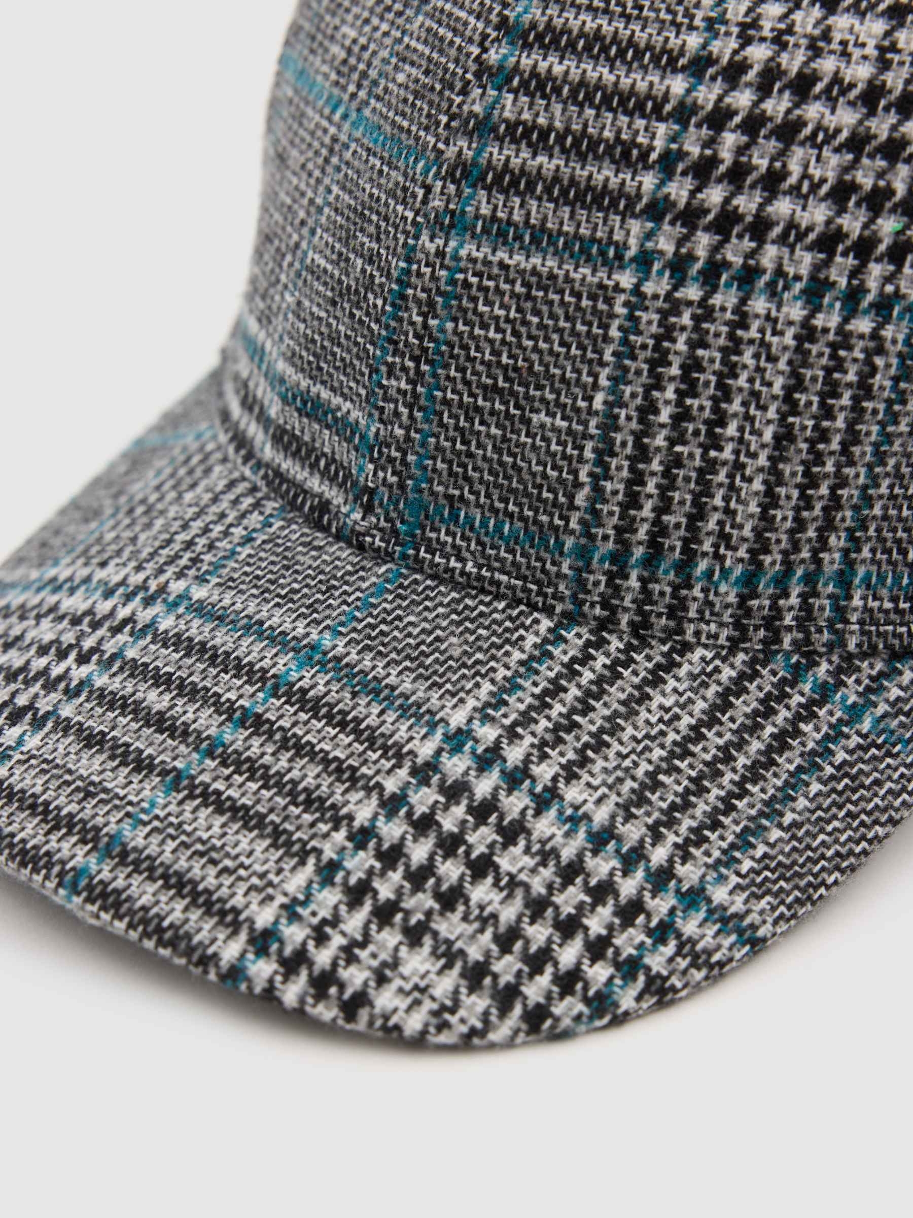 Gorra baseball cuadros gris vista lateral frontal 45º