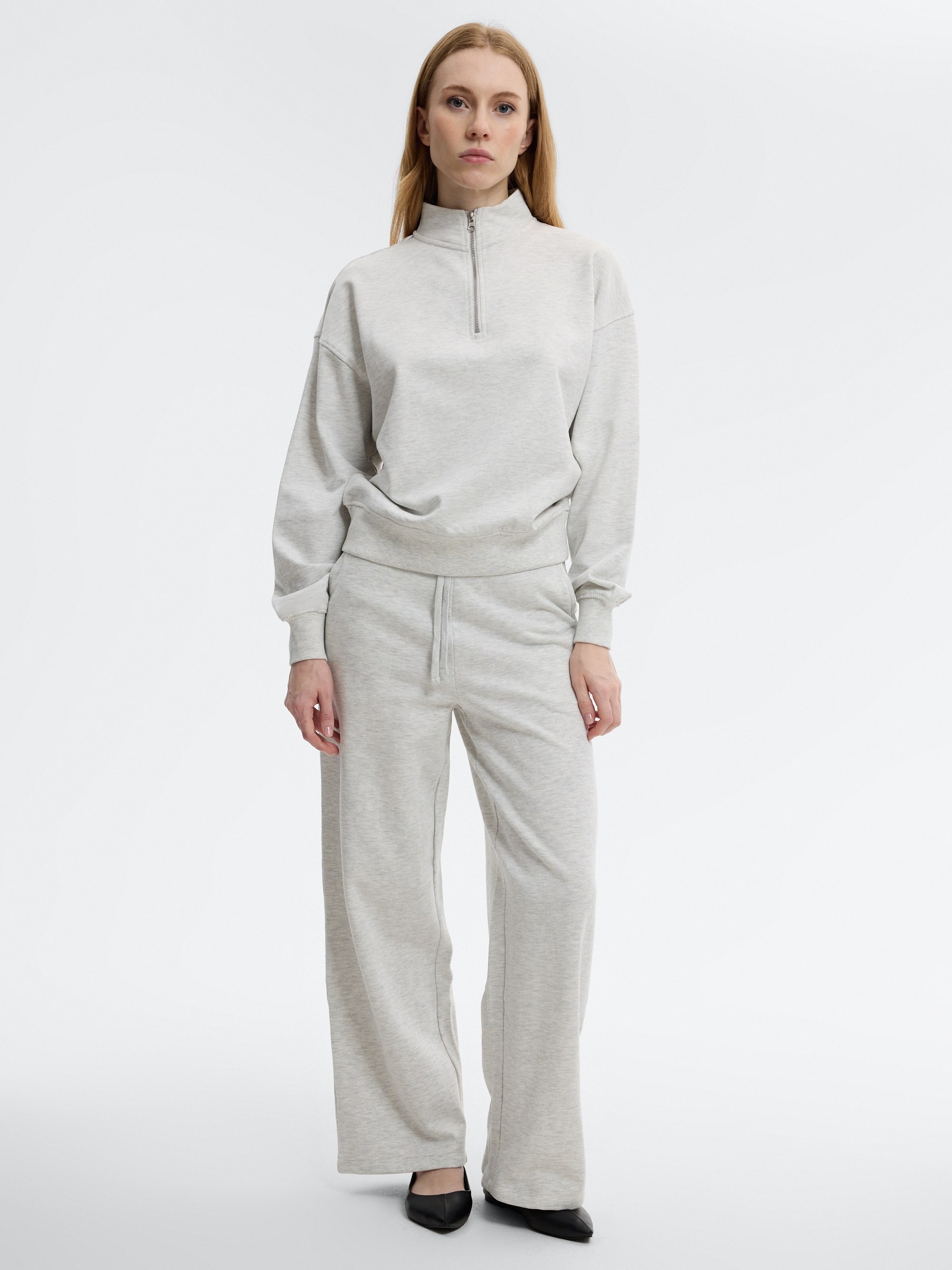 Plain high-waisted fleece sweatpants light melange front view