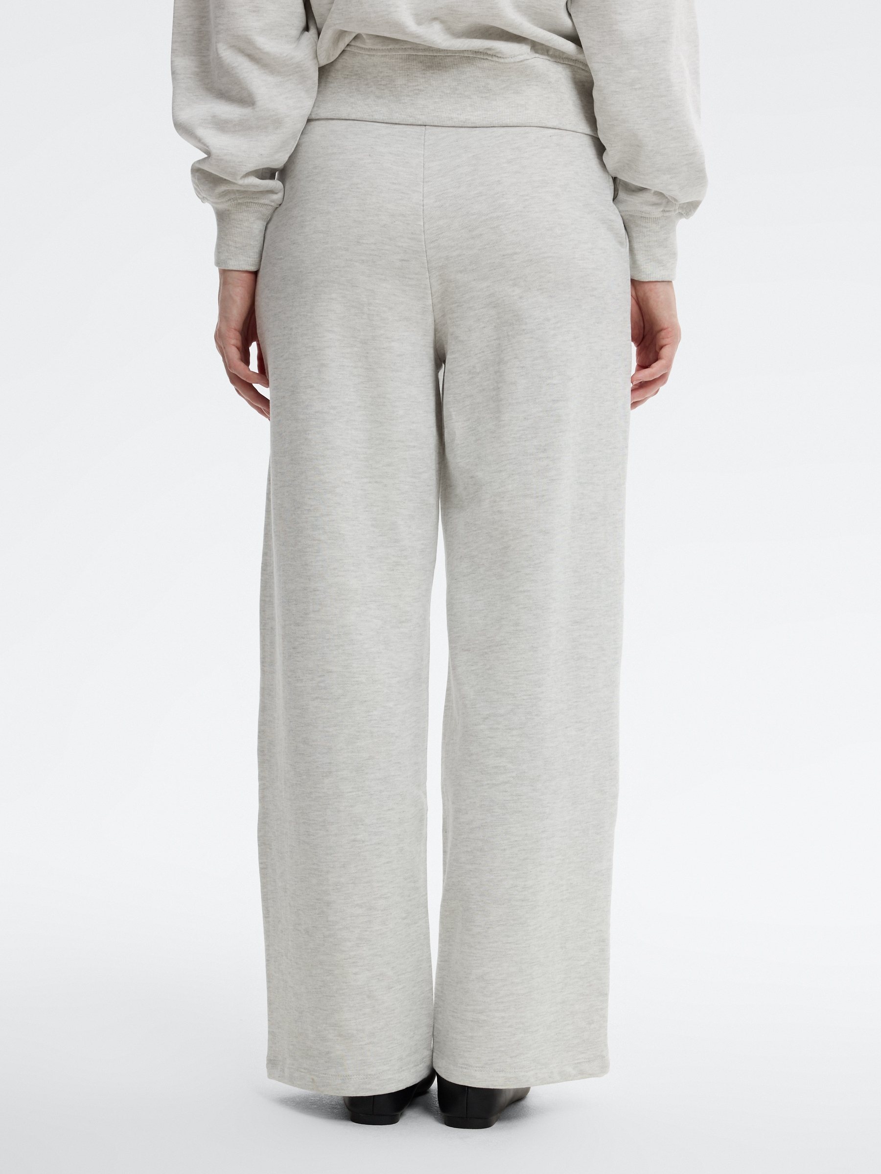 Plain high-waisted fleece sweatpants light melange front view