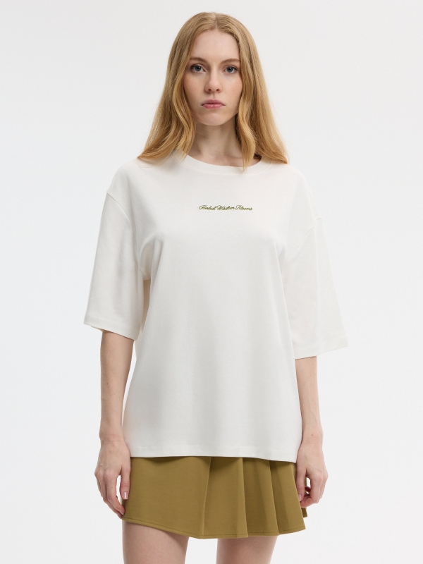 Camiseta oversized algodão texto off white vista meia frontal