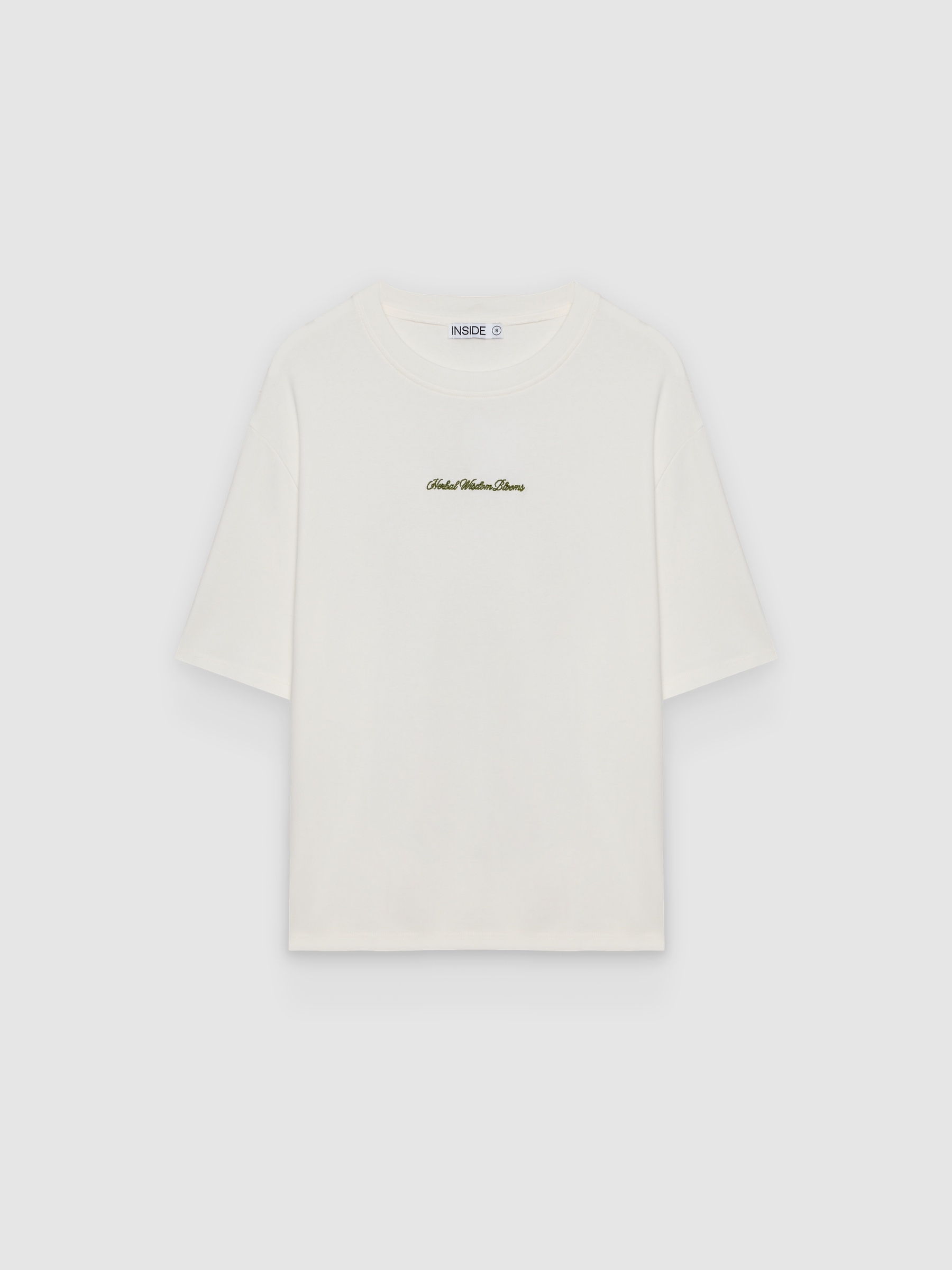 Camiseta oversize algodón texto blanco roto vista media frontal