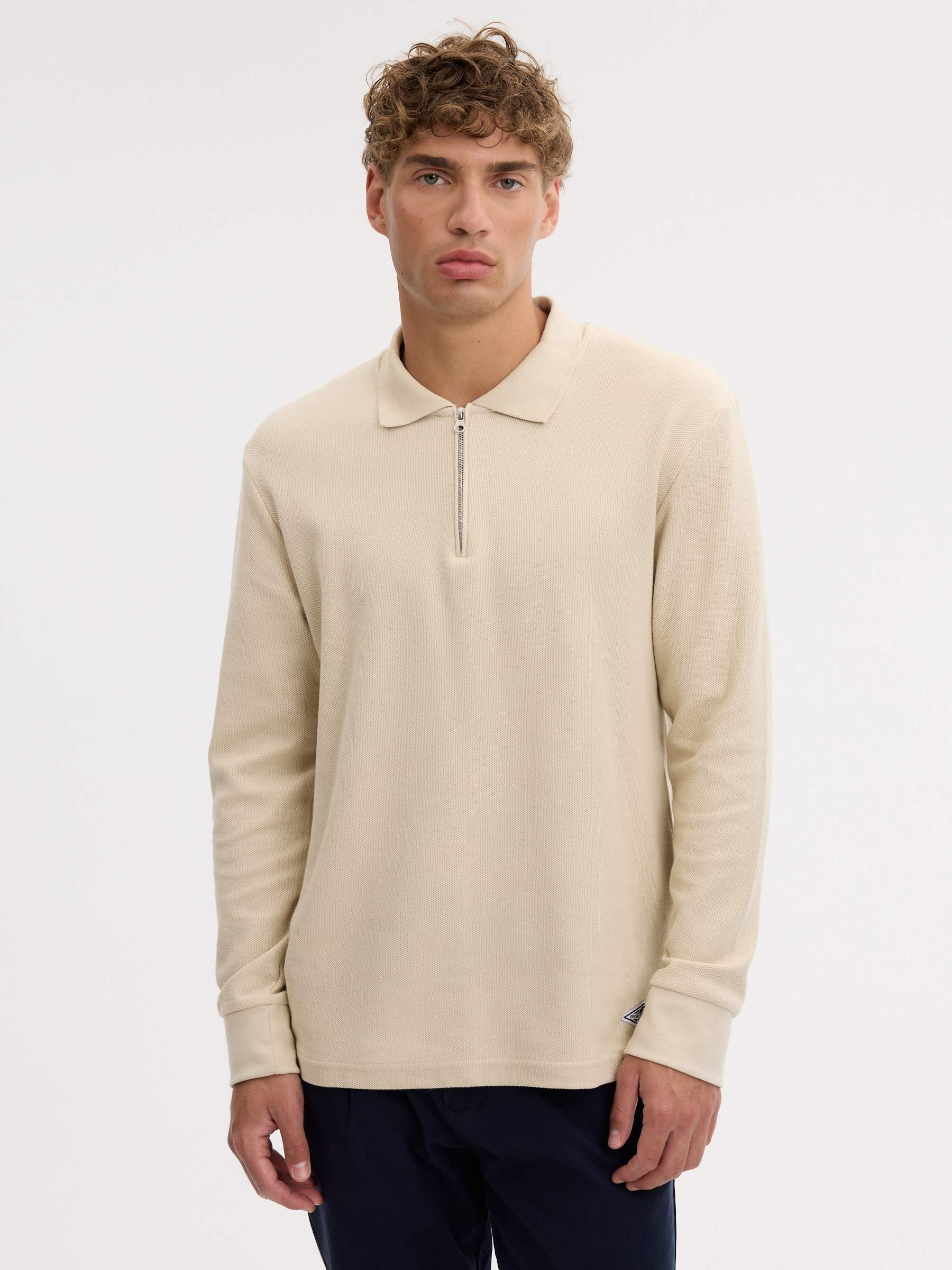 Polo oversized de manga longa liso crua vista meia frontal