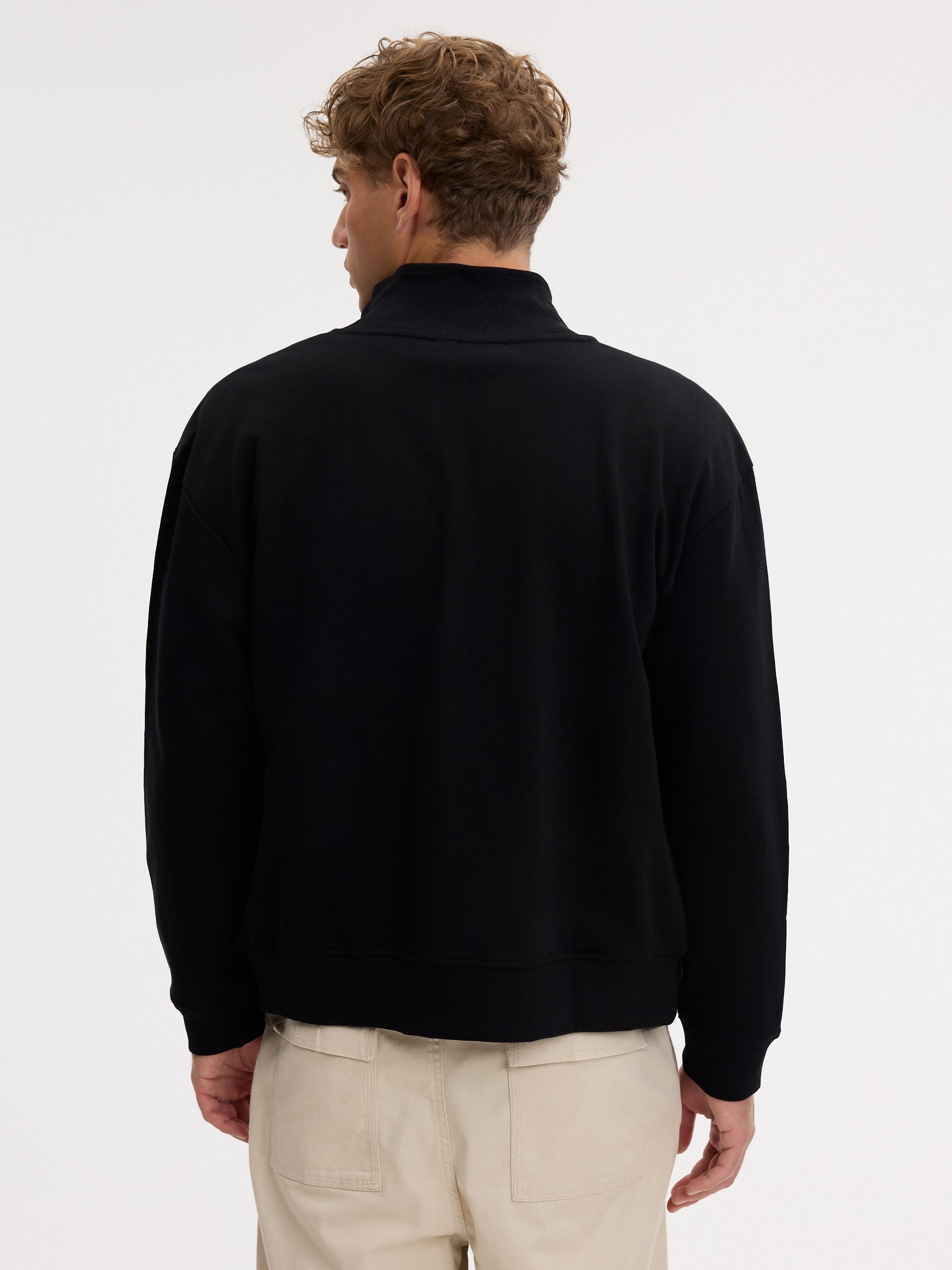 Chaqueta canalé cremallera cuello alto negro vista media frontal