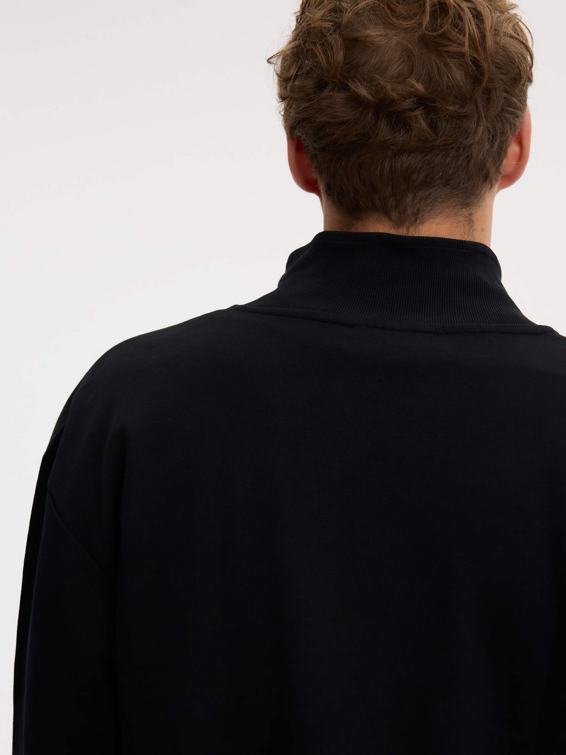 Chaqueta canalé cremallera cuello alto negro vista media frontal
