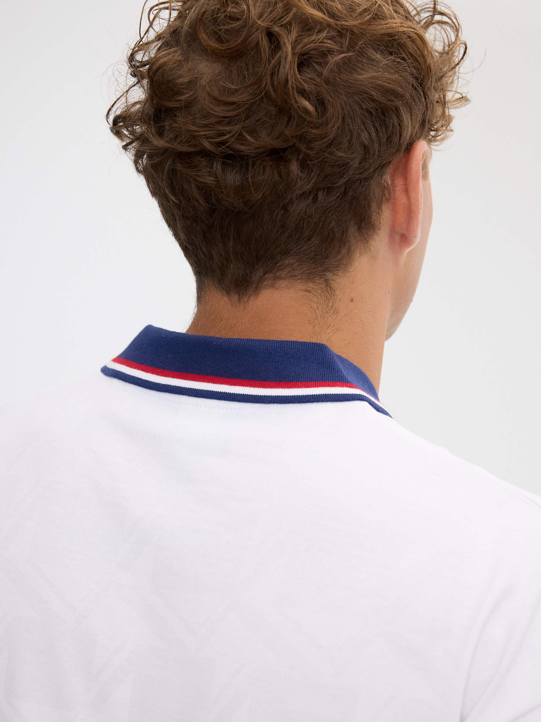 Regular printed football polo white middle front view
