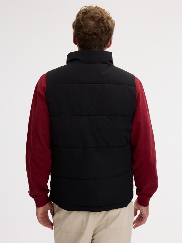 Chaleco multibolsillos nylon negro vista media trasera