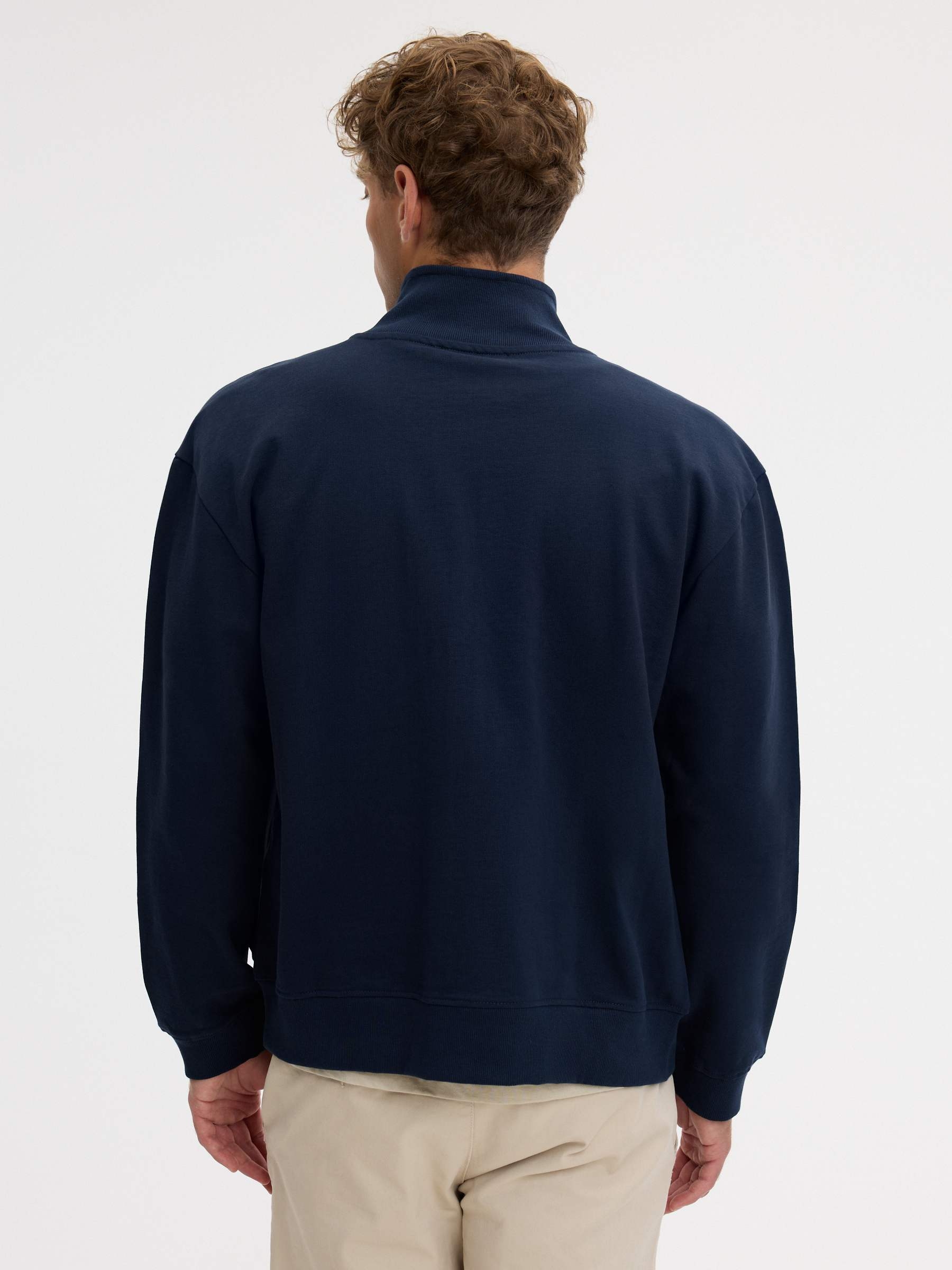 Chaqueta canalé cremallera cuello alto azul marino vista media frontal