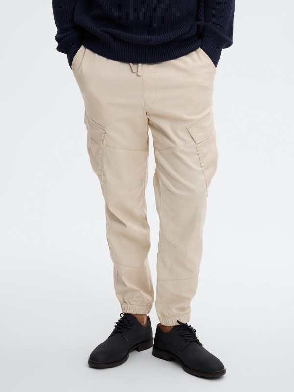 High-rise cargo jogger pants raw middle front view
