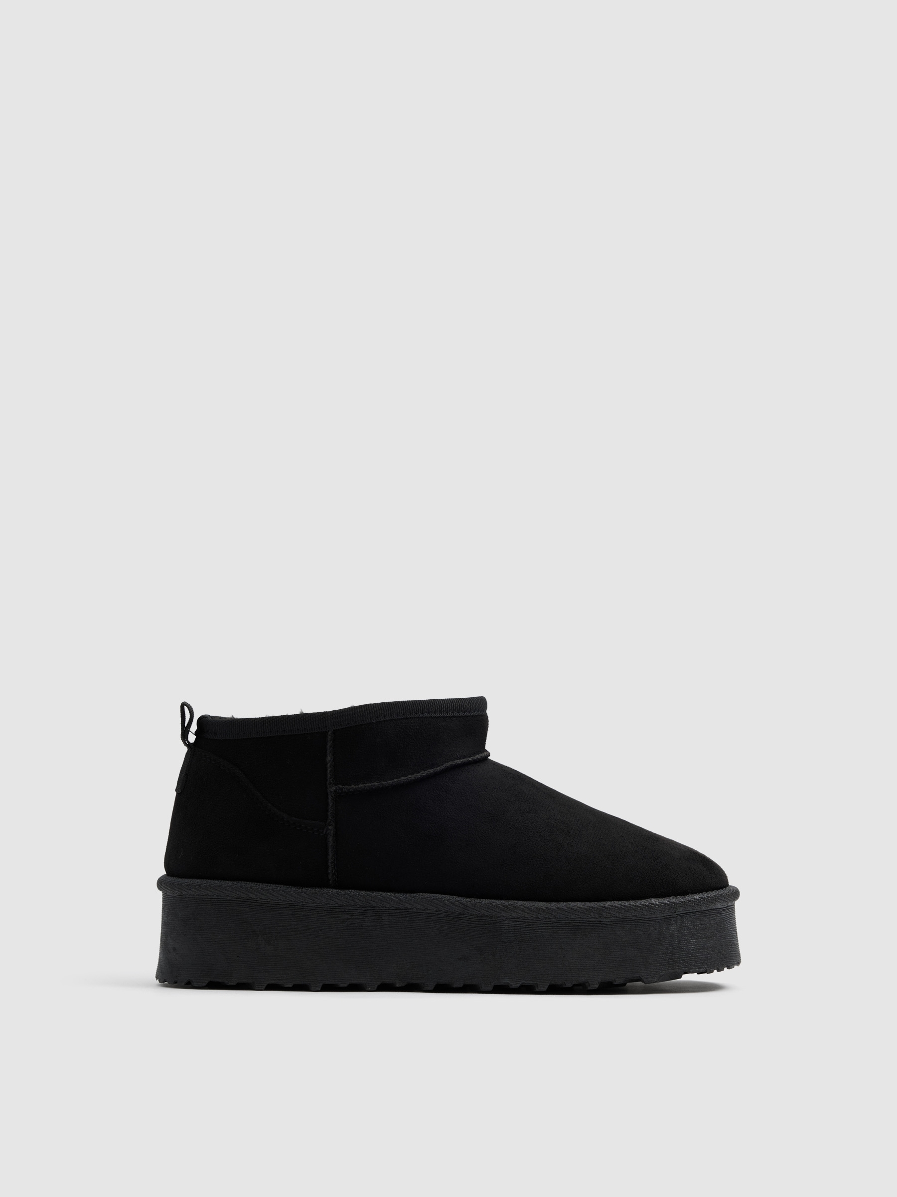 Botins plataforma forro de pelo preto