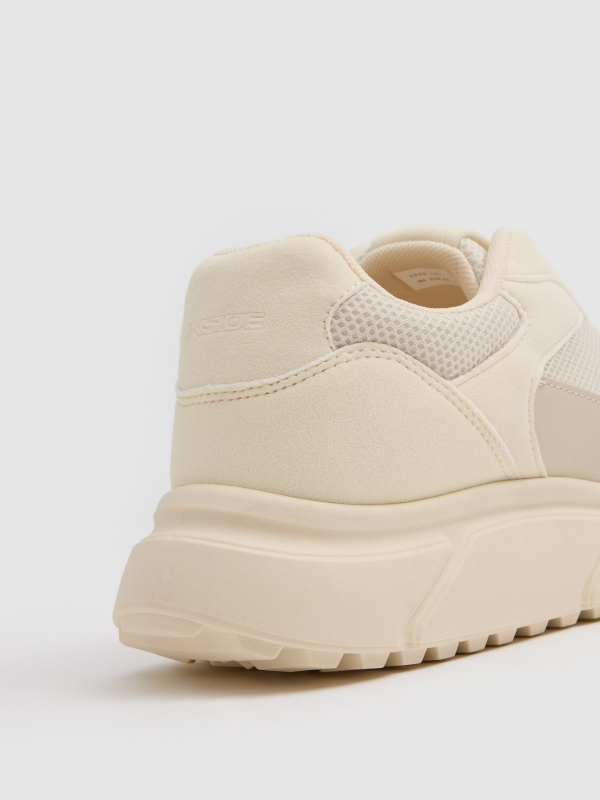 Low-top mesh sneaker sand detail view