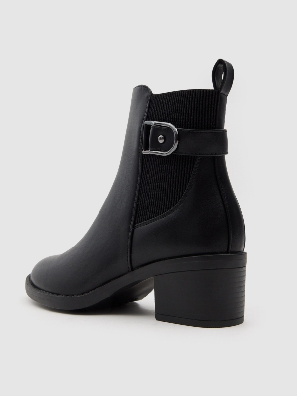 Chelsea ankle boot medium heel buckle black zenithal view
