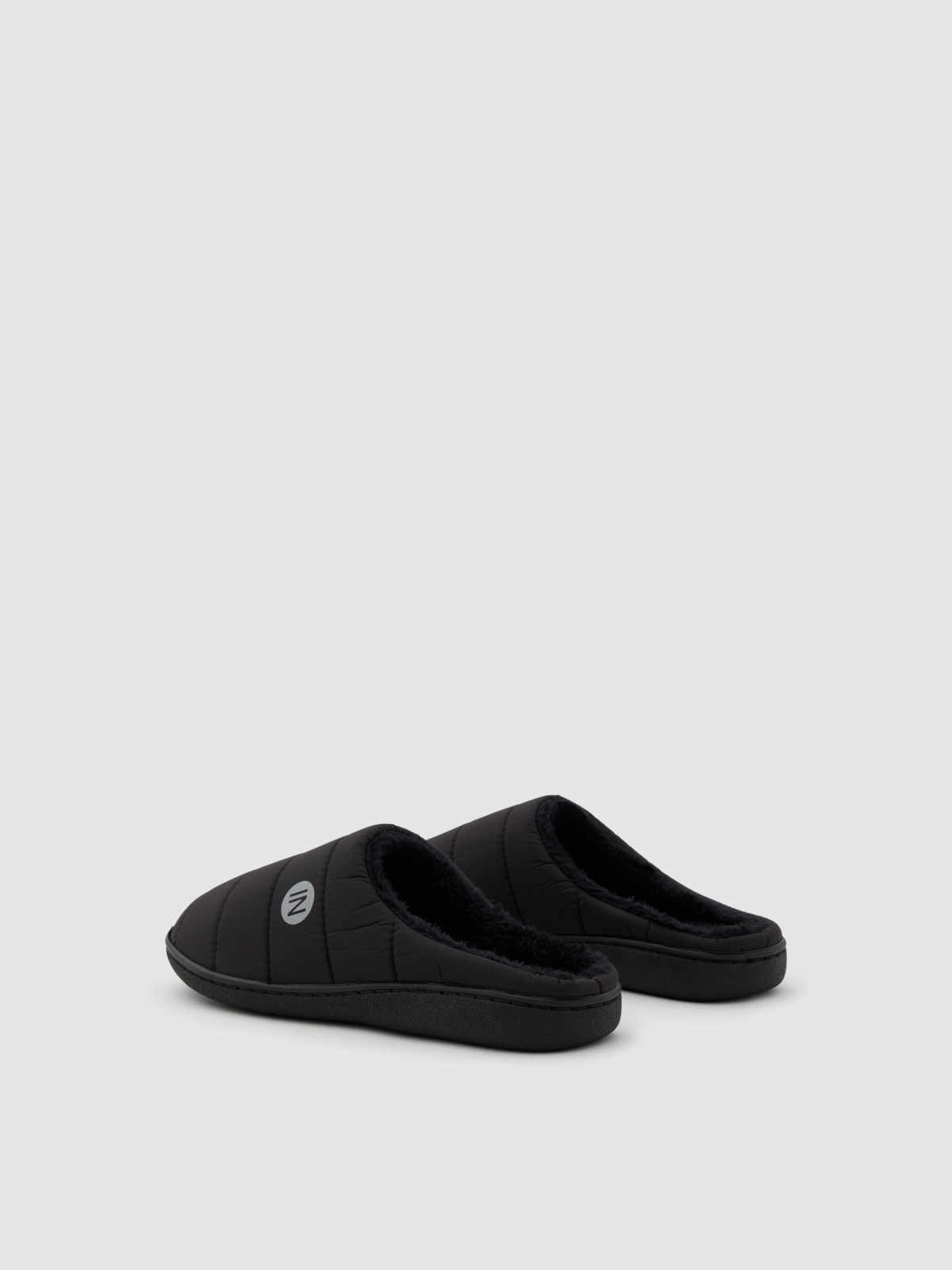 Backless slipper with fur lining black middle back view