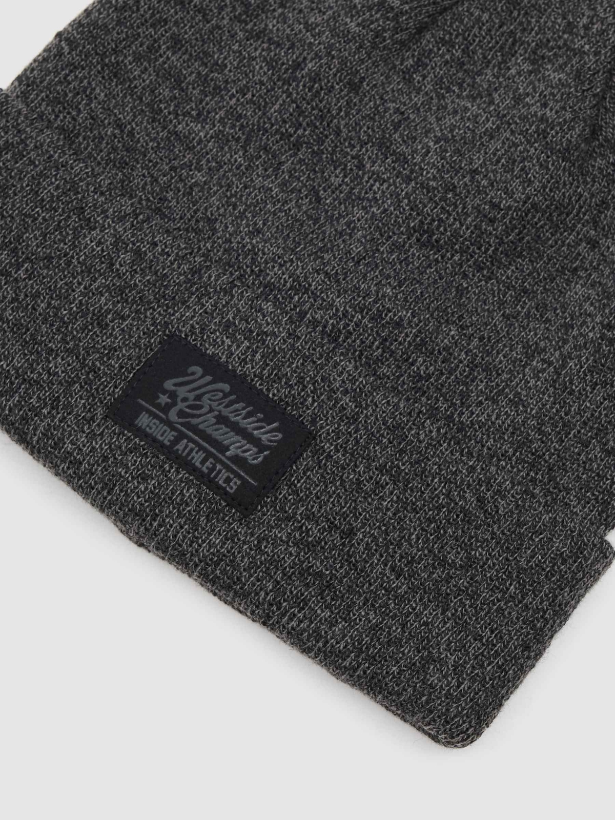 Beanie with ribbed fold-over brim dark melange 45º back view
