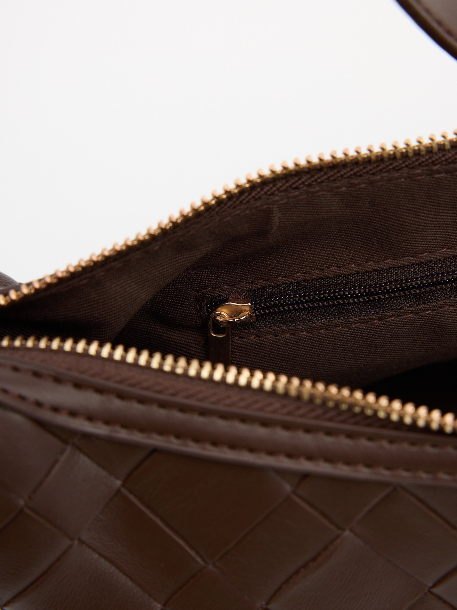 Braided shoulder bag leather effect dark brown front view
