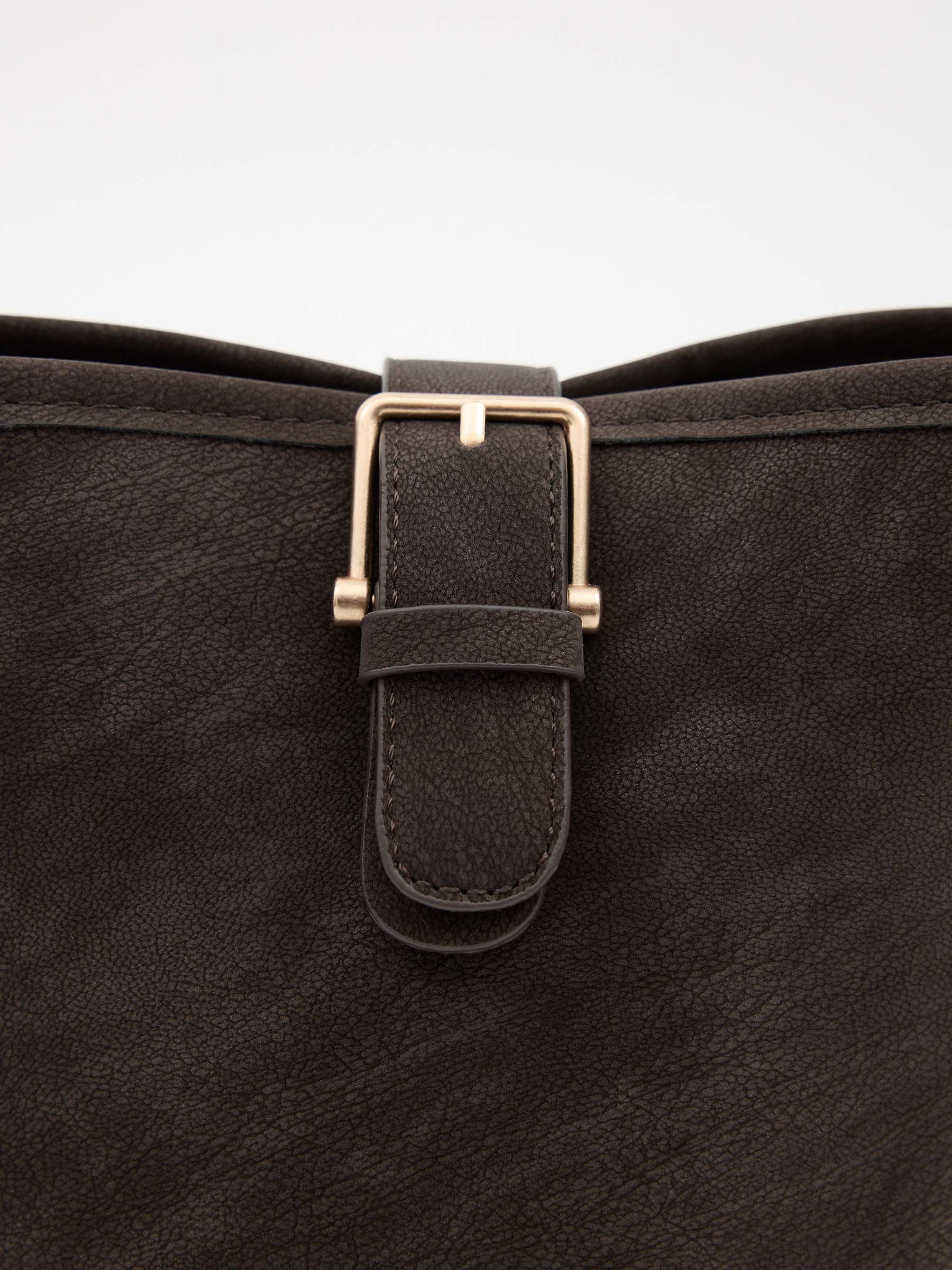 Shoulder bag with gold buckle dark brown front view