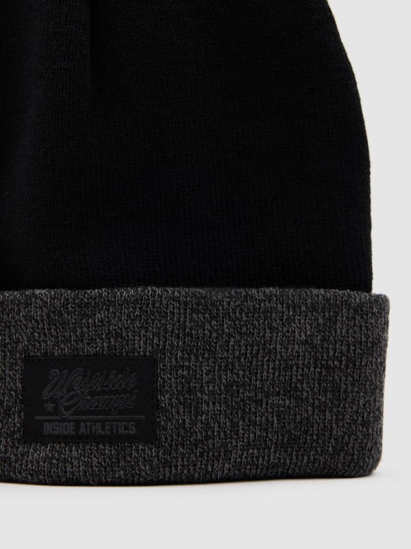Gorro vuelta gris oscuro vista lateral trasera 45º