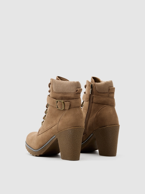 Mountaineering ankle boot with buckle heel beige 45º back view