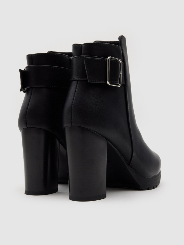 High ankle boot with buckle and wide heel black detail view