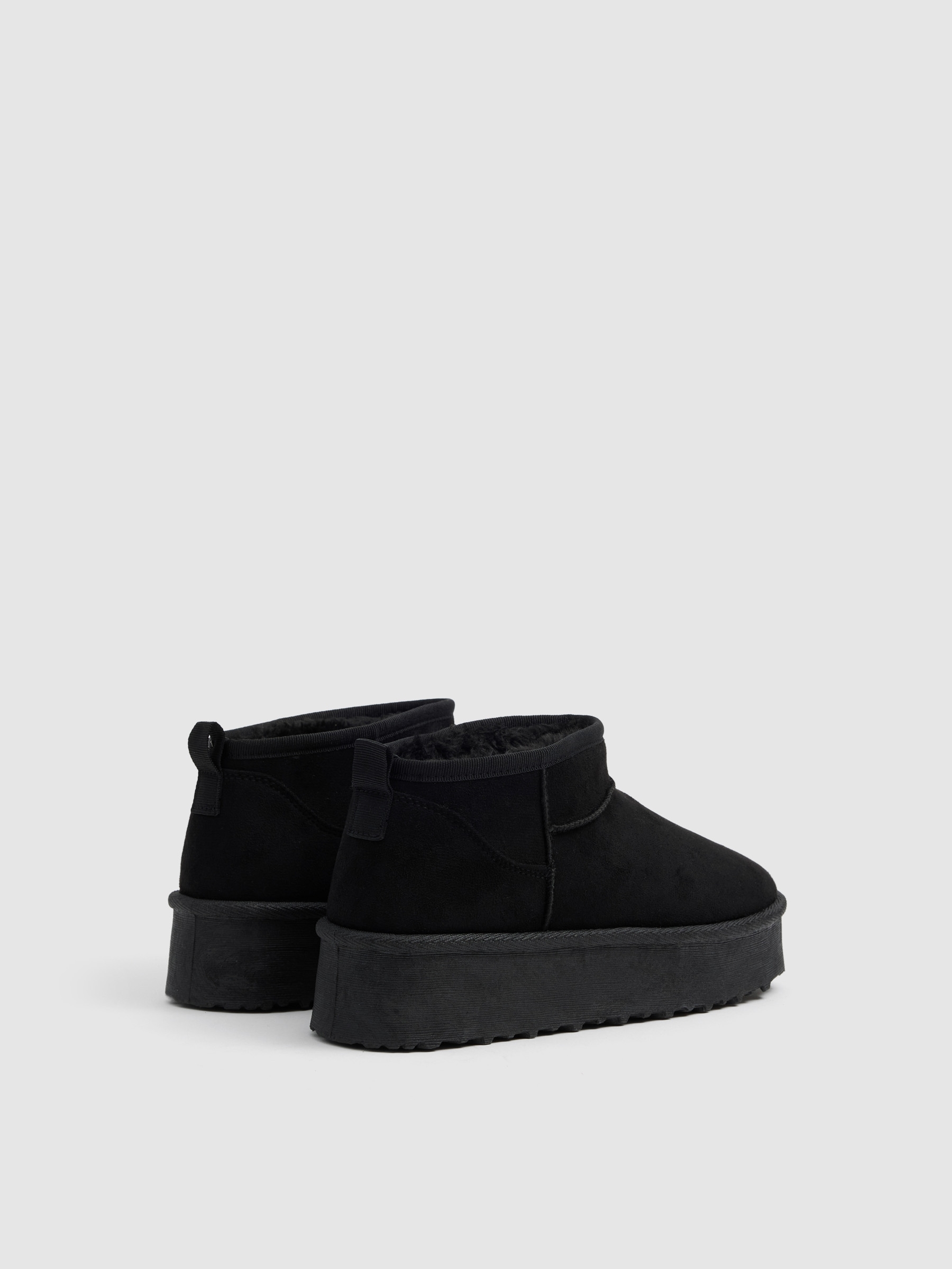 Botins plataforma forro de pelo preto